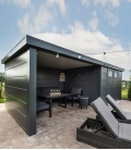 Abri de jardin en acier Eleganto 3330 de 9,8 m² avec auvent extra large de 13.8m²