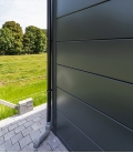Abri de jardin en acier Eleganto 2724 de 6,4 m² avec auvent small ouvert de 4m²